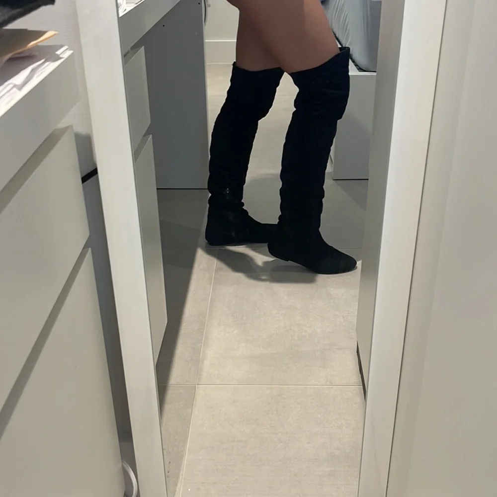 Women size 6 Black over the knee boots zipper on the inside soft suede alike